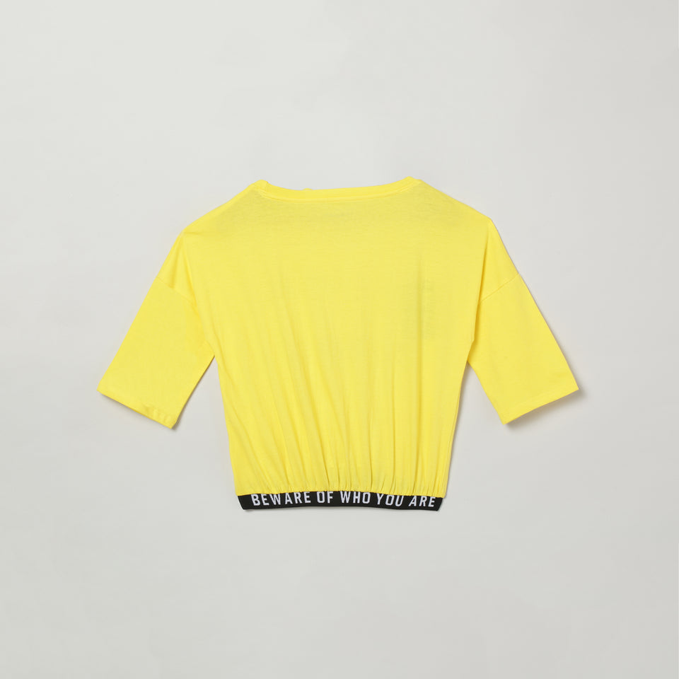 girls yellow printed round neck crop top t-shirt