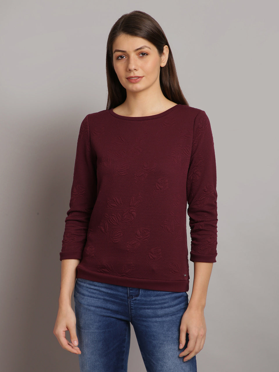 women solid maroon self design pullover sweatshirt